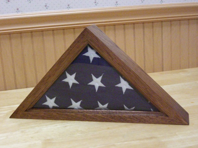 Oak flag case with folded flag