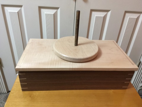 This is a Knitting storage box with turntable table