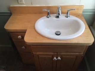 This is a Curly Maple wood bathroom vanity top	